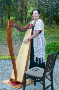 Suzette M:  I just love the way she plays this ancient harp.