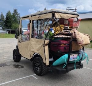 2023 - Here's one happy Bayview resident leaving the Bayview Community Council's yardsale with her cart full to the max!