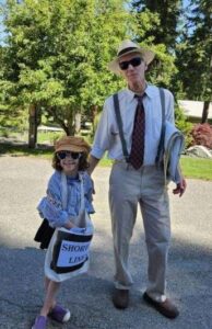 Iris, our wonderful paper girl, walking with her Grandad, John , delivered over 75 Shore Line papers to the crowd during the Bayview Daze Parade 2024