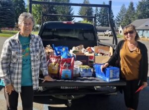 2026 Food Drive delivery by Council members Judi White and Sheryl Puckett